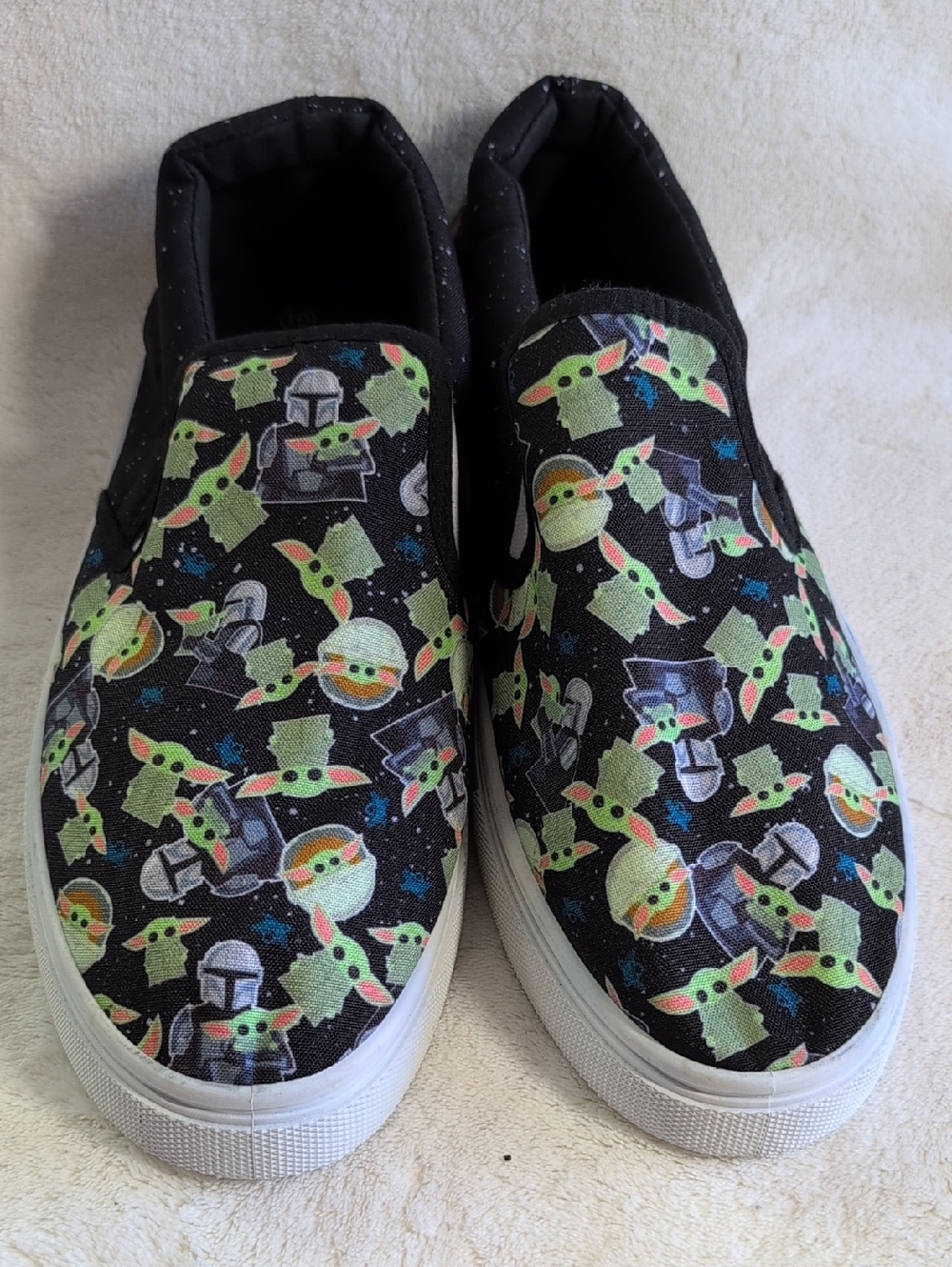 Woman's Black Slip-On Sneakers with Green Character Pattern